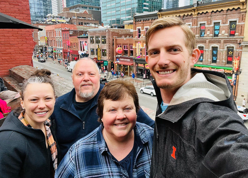 Emily, her parents and me taking a photo above Broadway Street in Nashville, TN.